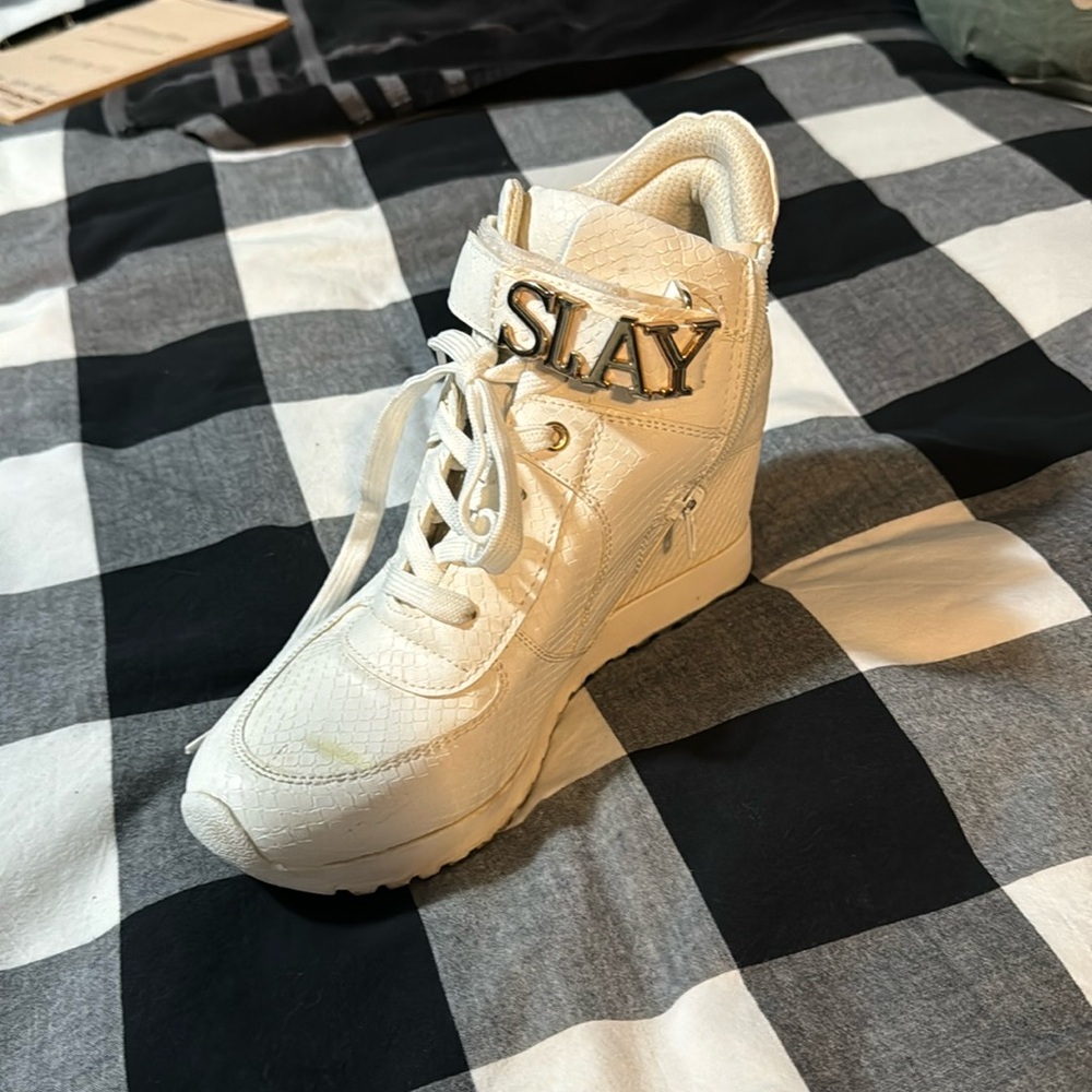 Slightly worn white wedge sneakers